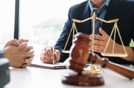 Lawyer consulting with client on international franchise expansion and cross-border legal agreements.