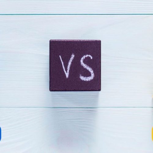 A blue figure with a downward arrow labeled "Incorporation" and a yellow figure with an upward triangle labeled "Sole Proprietorship," separated by a "VS" symbol, representing t "Incorporation vs. Sole Proprietorship business"