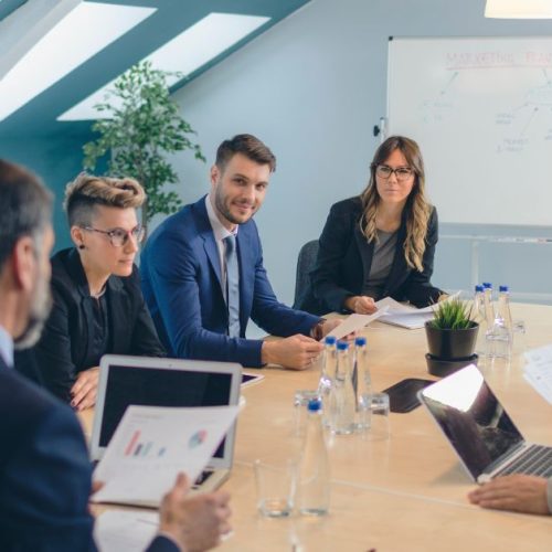 Corporation employees are having a meeting.